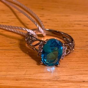 Size 7-7.5 Sterling Silver Ring with blue stone
